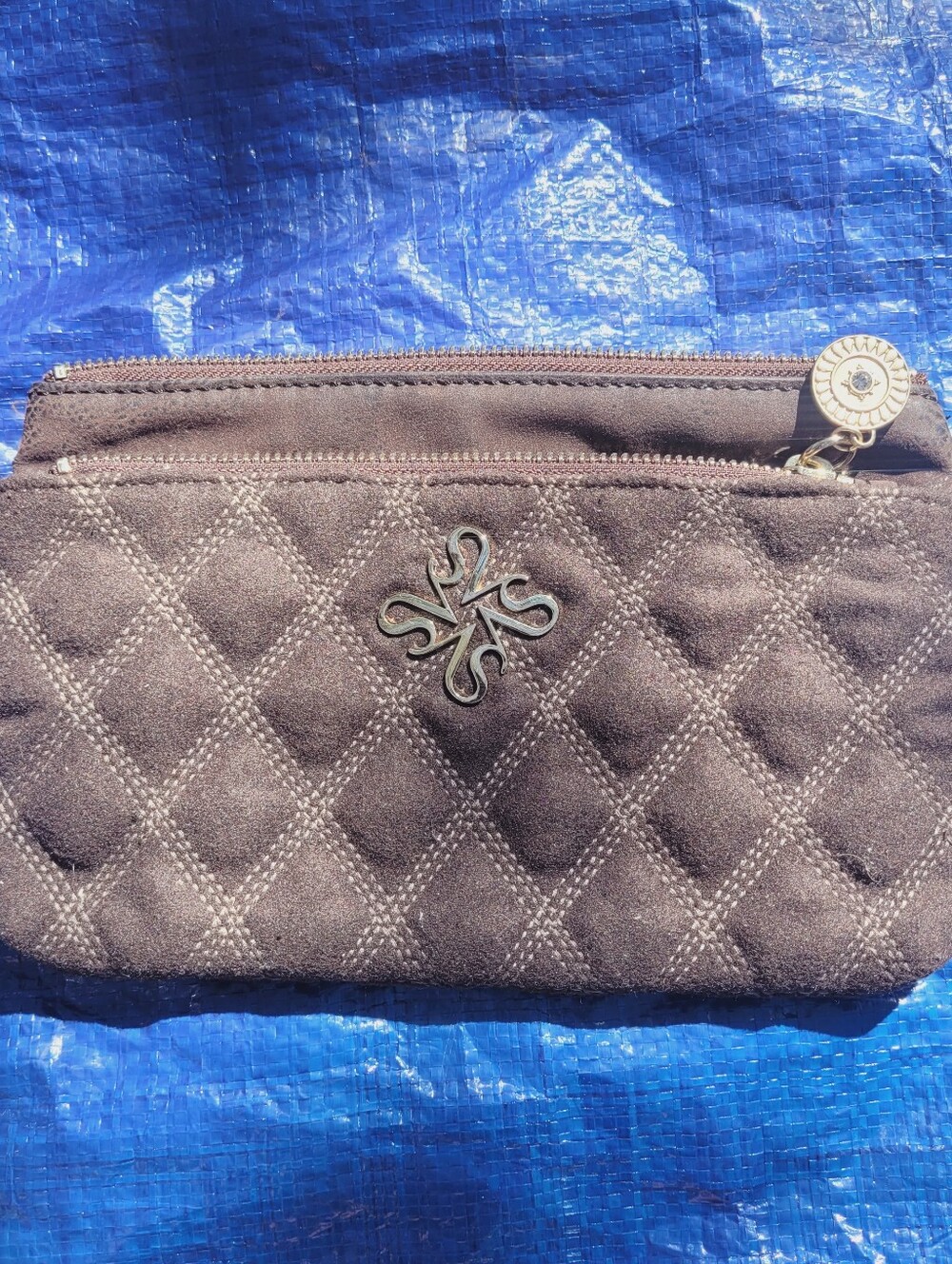 Vera Wang Quilted Brown Wristlet Clutch with Decorative Emblem